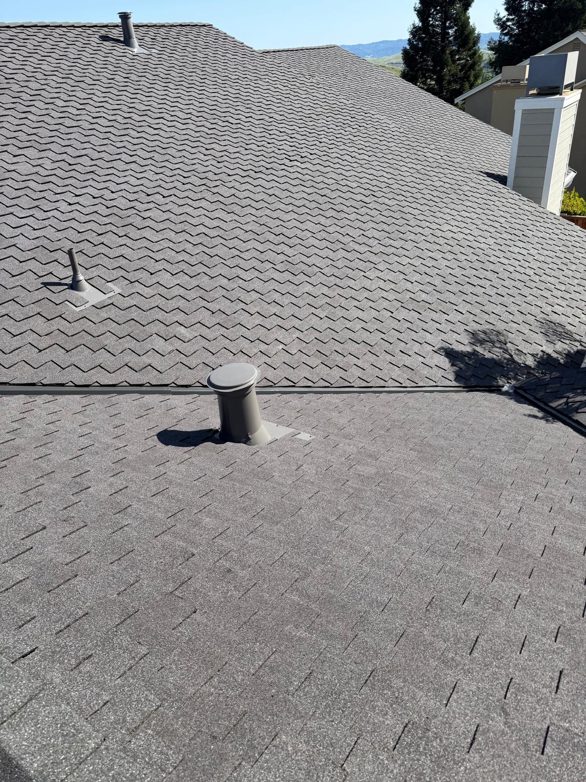 Residential roof ventilation system being evaluated