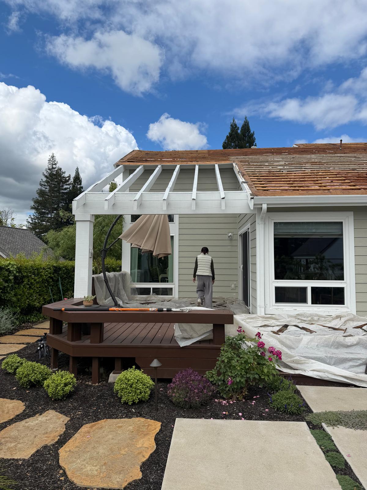 Cracked residential roof tiles requiring repair