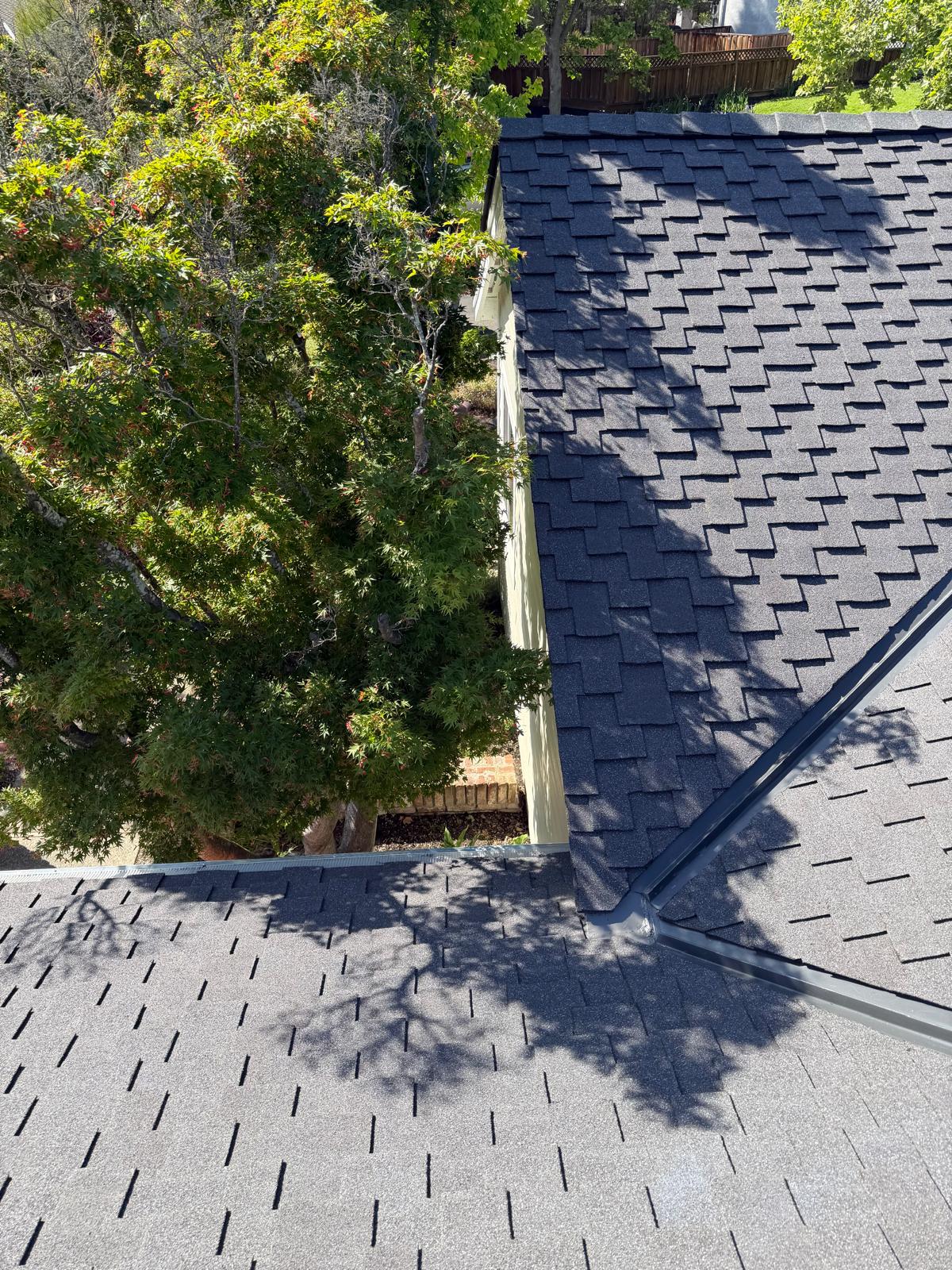Complex residential roofline on a San Jose property